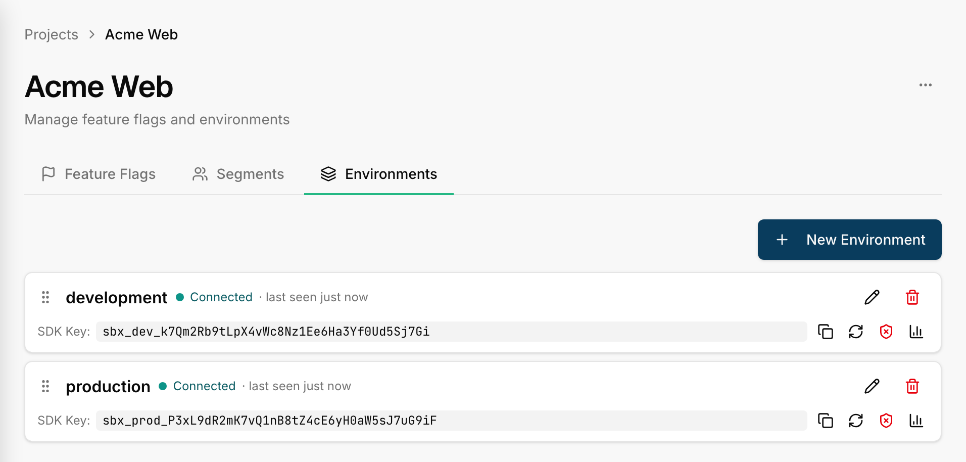 The Environments tab, showing development and production each with its own SDK key and connection status